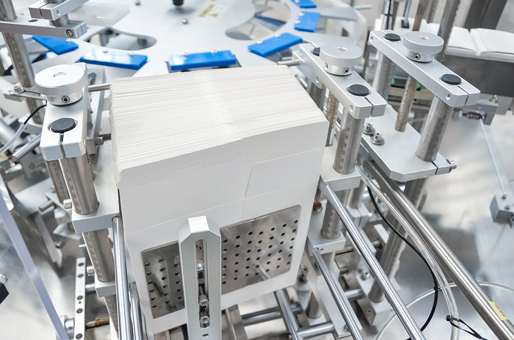 3.-Cardboard-leaflet-feeding 3.-Alimentação de folhetos de papelão