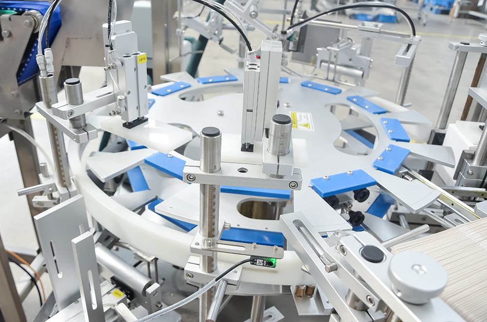 4.-Caixa de papel&atilde;o com alimenta&ccedil;&atilde;o autom&aacute;tica