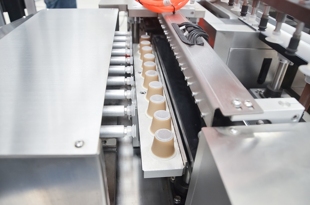 2.-Sistema de reviravolta de c&aacute;psulas