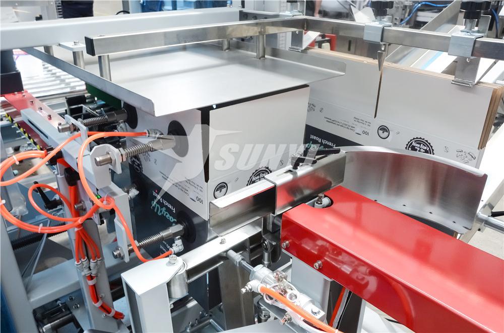 4.-Eretor autom&aacute;tico de caixa de papel&atilde;o