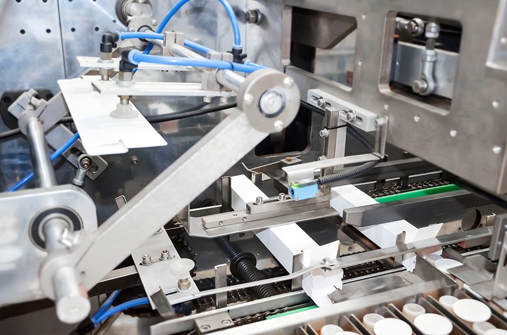 5.-Cartonagem-Empurre-c&aacute;psulas-em-caixas